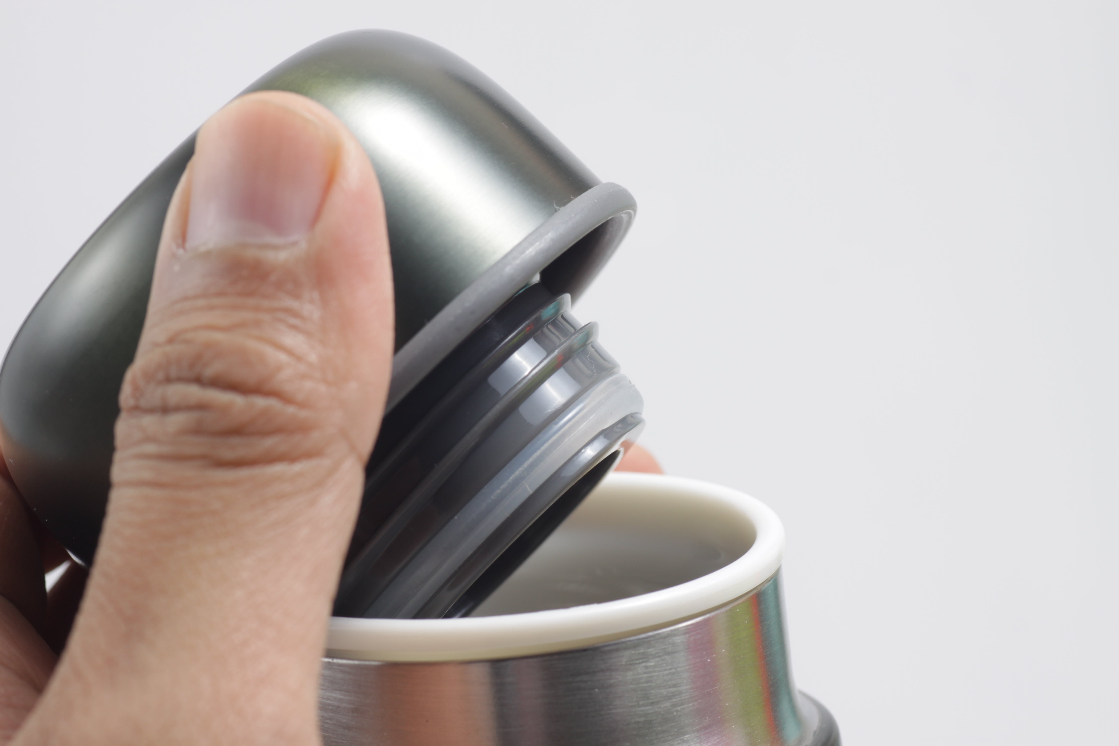 Why Your Stainless Steel Bottle Or Mug Tastes Like Metal & How To